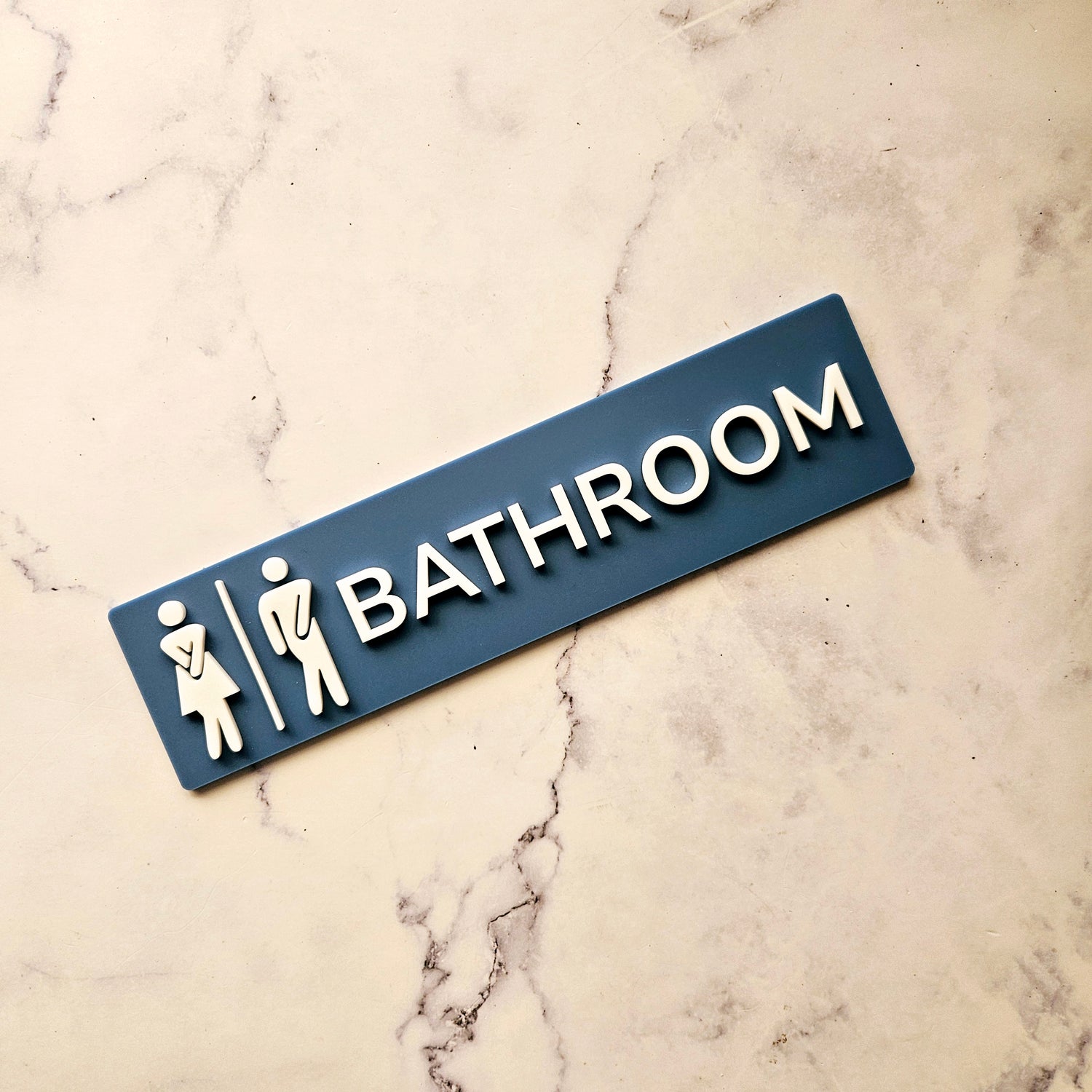 Rectangle bathroom sign with white 3d letters