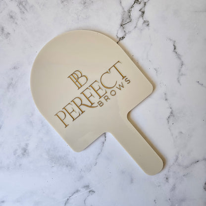 Custom Handheld Mirror Personalised with Branding in Gold for Salons made by Custom Aesthetic Designs