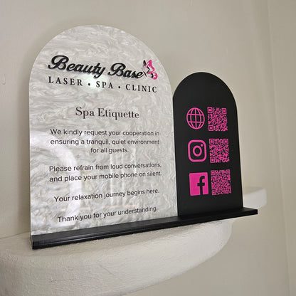 Double arch sign with spa etiquette and qr codes